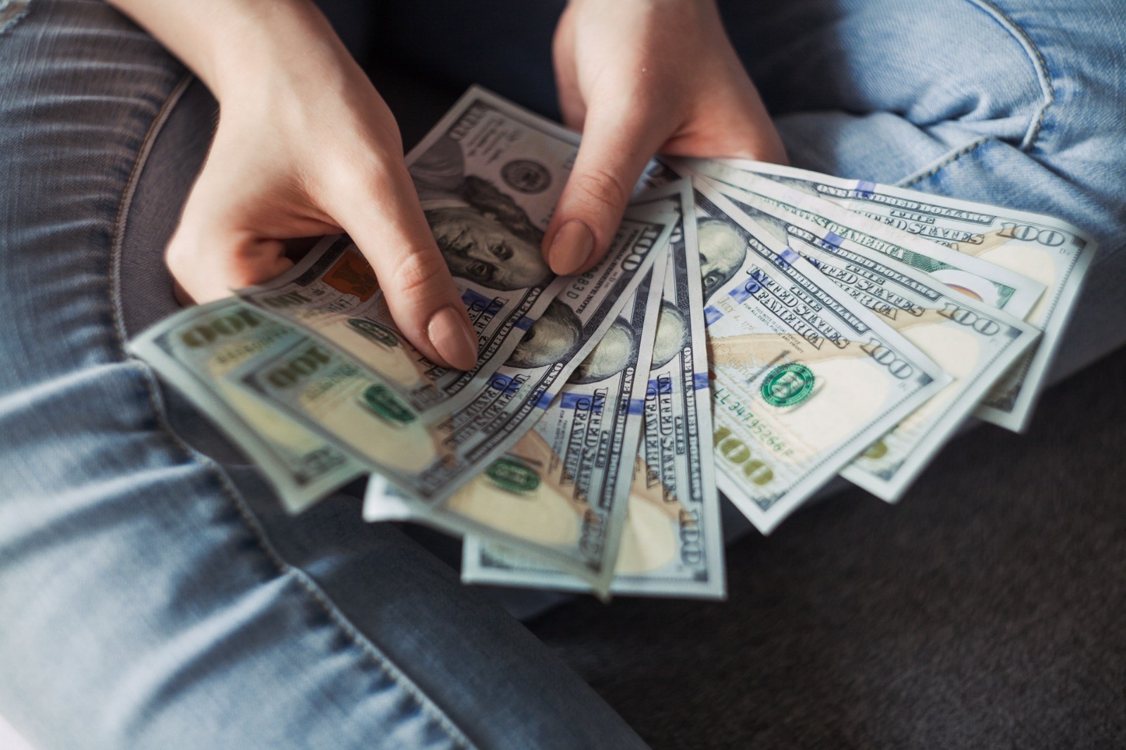 5df9e0731f801.jpg person-holding-100-us-dollar-banknotes-2068975.jpg